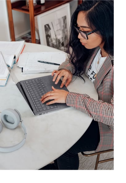 Blog Inset - Woman with glasses working2